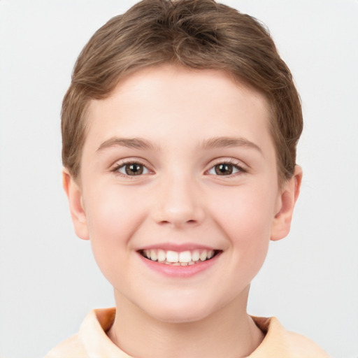 Joyful white child female with short  brown hair and brown eyes