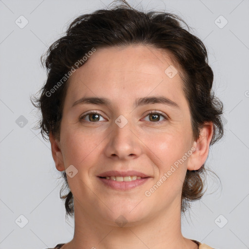 Joyful white young-adult female with medium  brown hair and green eyes