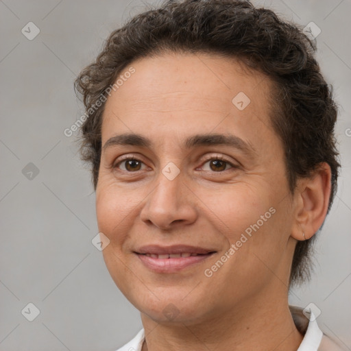 Joyful white adult female with short  brown hair and brown eyes