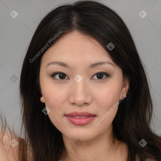 Joyful asian young-adult female with long  brown hair and brown eyes