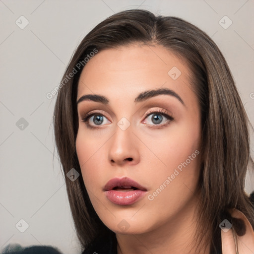 Neutral white young-adult female with medium  brown hair and brown eyes