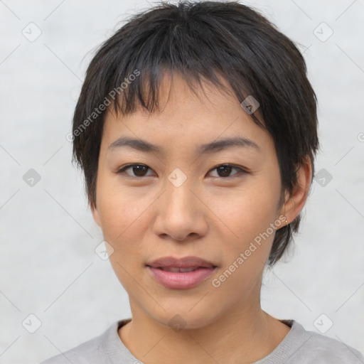 Joyful asian young-adult female with short  brown hair and brown eyes