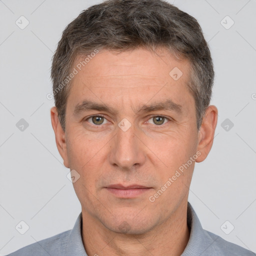 Neutral white adult male with short  brown hair and brown eyes