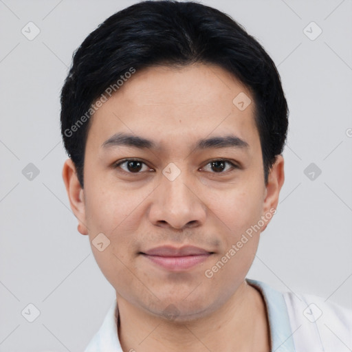 Joyful white young-adult male with short  black hair and brown eyes