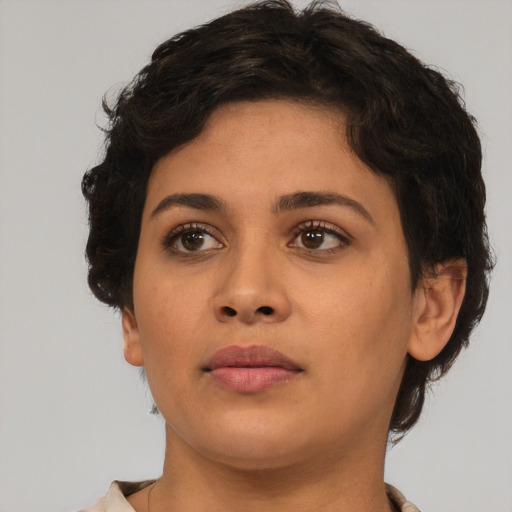 Neutral white young-adult female with short  brown hair and brown eyes