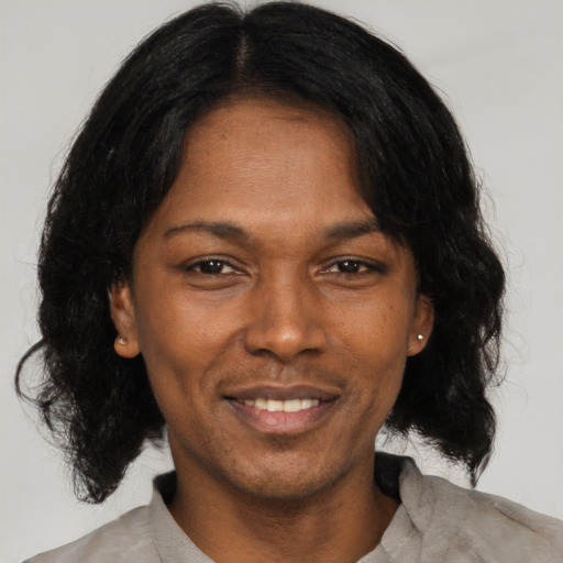 Joyful asian adult female with medium  black hair and brown eyes