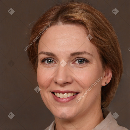 Joyful white adult female with medium  brown hair and brown eyes