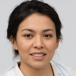 Joyful asian young-adult female with medium  brown hair and brown eyes