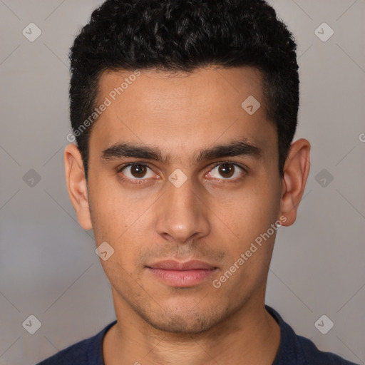 Neutral latino young-adult male with short  black hair and brown eyes