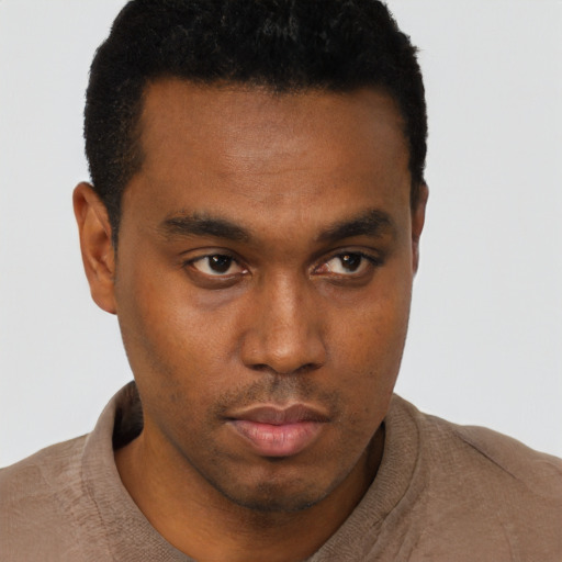 Neutral latino young-adult male with short  brown hair and brown eyes