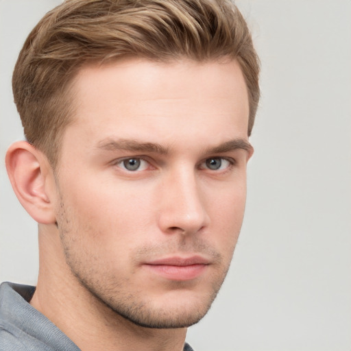 Neutral white young-adult male with short  brown hair and grey eyes