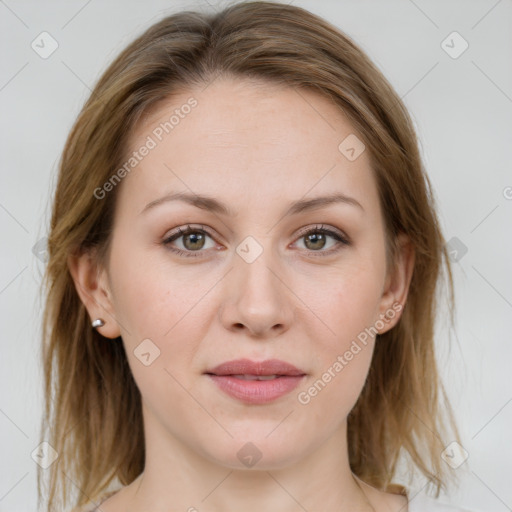 Joyful white young-adult female with medium  brown hair and blue eyes