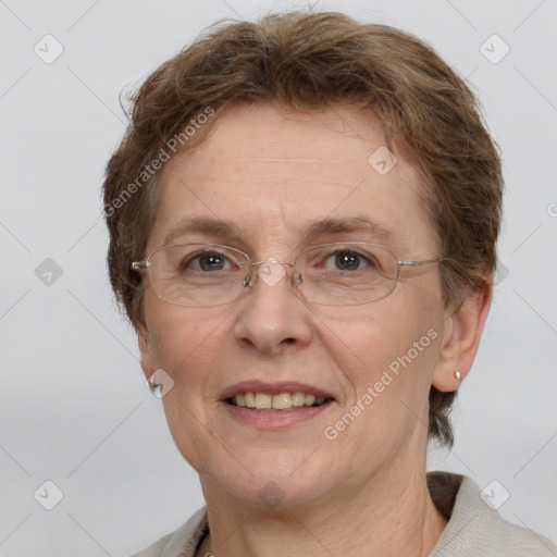 Joyful white adult female with short  brown hair and grey eyes