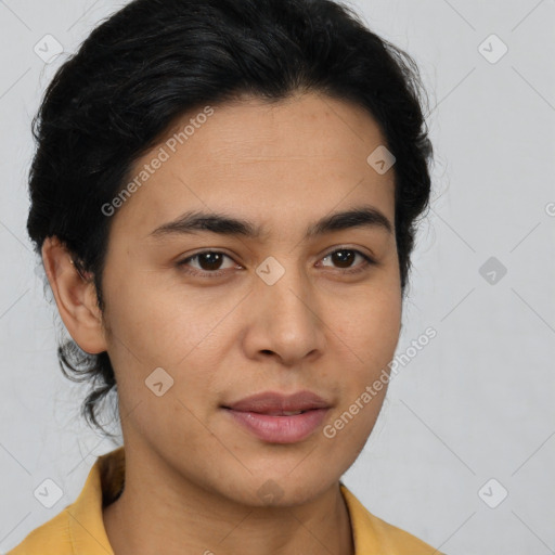 Joyful latino young-adult male with short  brown hair and brown eyes