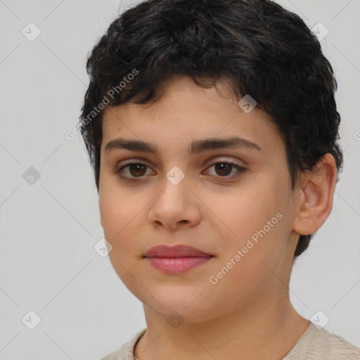 Joyful latino young-adult female with short  brown hair and brown eyes