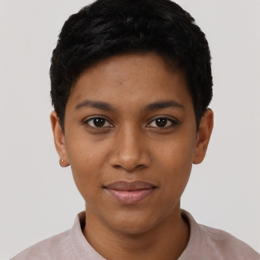 Joyful black young-adult female with short  black hair and brown eyes