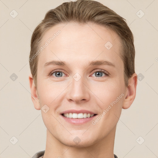 Joyful white young-adult female with short  brown hair and grey eyes