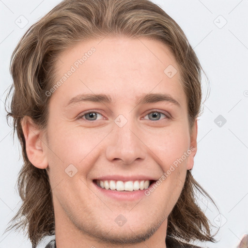 Joyful white young-adult female with long  brown hair and grey eyes