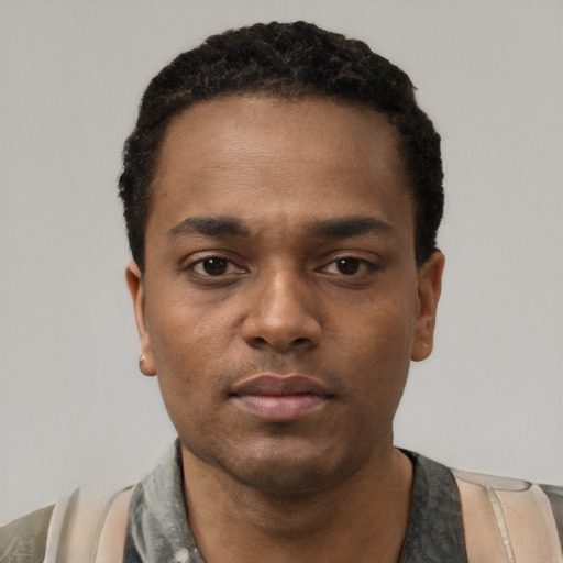 Neutral black young-adult male with short  black hair and brown eyes