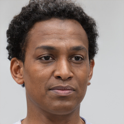 Neutral black young-adult male with short  brown hair and brown eyes