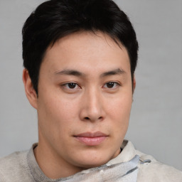 Neutral asian young-adult male with short  brown hair and brown eyes