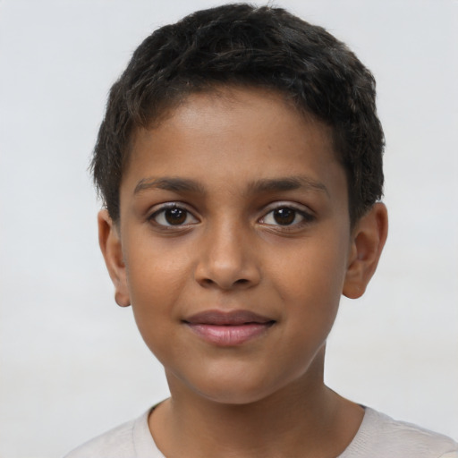 Joyful black child female with short  brown hair and brown eyes