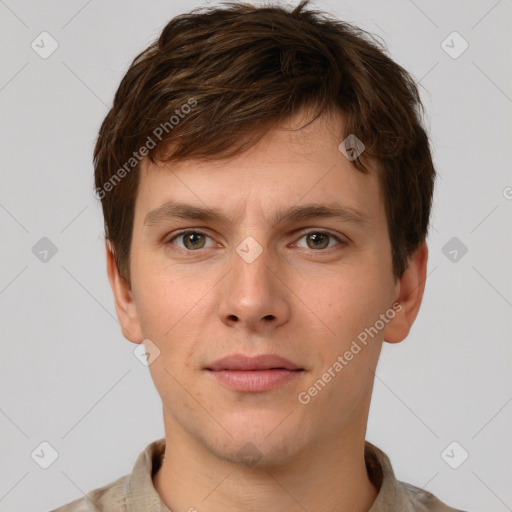 Neutral white young-adult male with short  brown hair and grey eyes