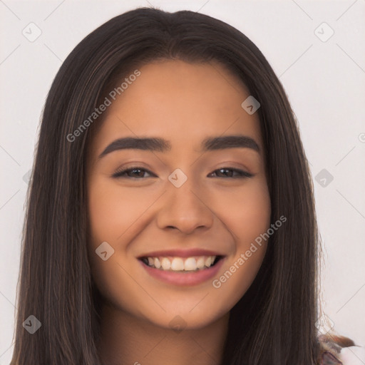 Joyful asian young-adult female with long  brown hair and brown eyes