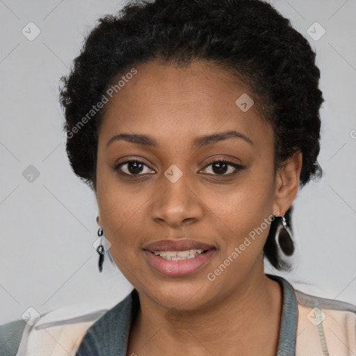 Joyful black young-adult female with short  black hair and brown eyes