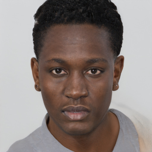 Neutral black young-adult male with short  brown hair and brown eyes