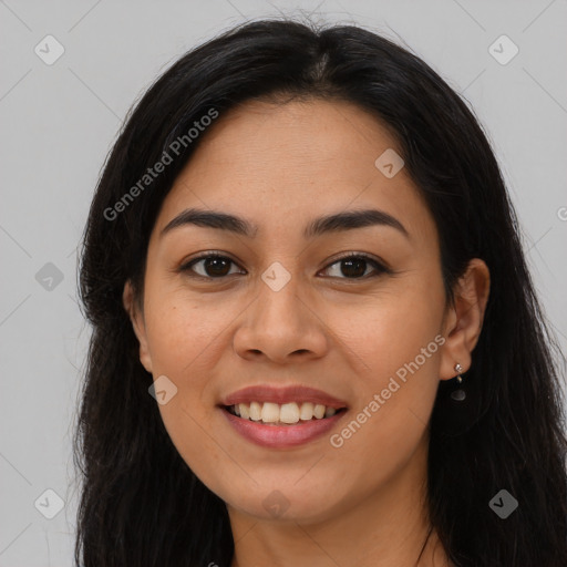 Joyful asian young-adult female with long  brown hair and brown eyes