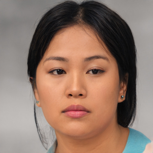 Neutral asian young-adult female with medium  brown hair and brown eyes