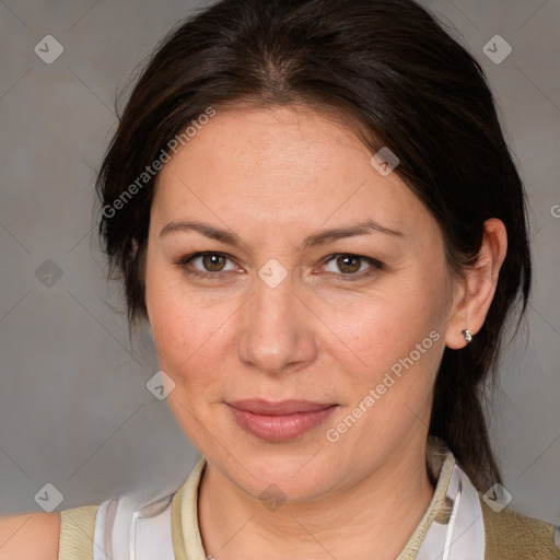 Joyful white adult female with medium  brown hair and brown eyes