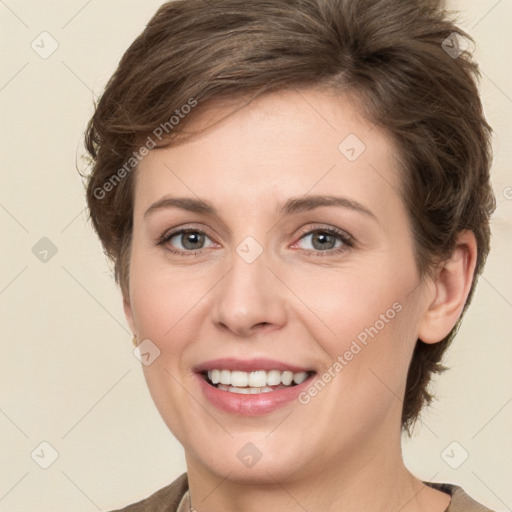 Joyful white young-adult female with medium  brown hair and green eyes