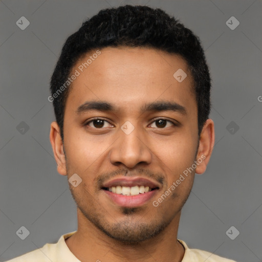 Joyful latino young-adult male with short  black hair and brown eyes