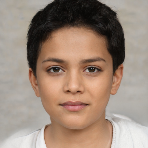 Joyful white child female with short  brown hair and brown eyes