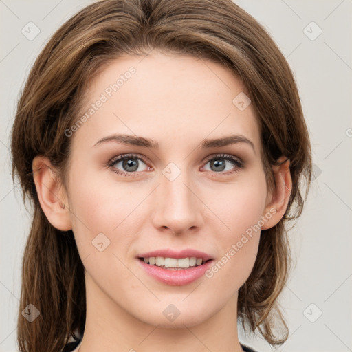 Joyful white young-adult female with medium  brown hair and green eyes