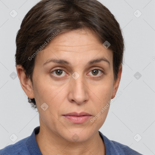 Joyful white adult female with short  brown hair and grey eyes