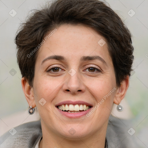 Joyful white adult female with short  brown hair and brown eyes