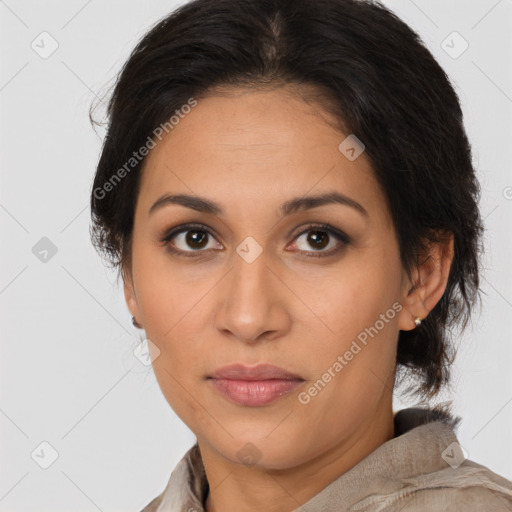 Joyful latino young-adult female with medium  brown hair and brown eyes