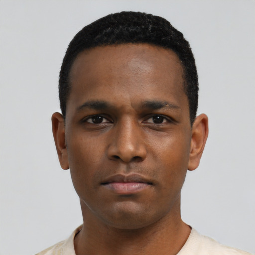 Neutral black young-adult male with short  black hair and brown eyes