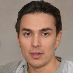 Neutral white adult male with short  brown hair and brown eyes