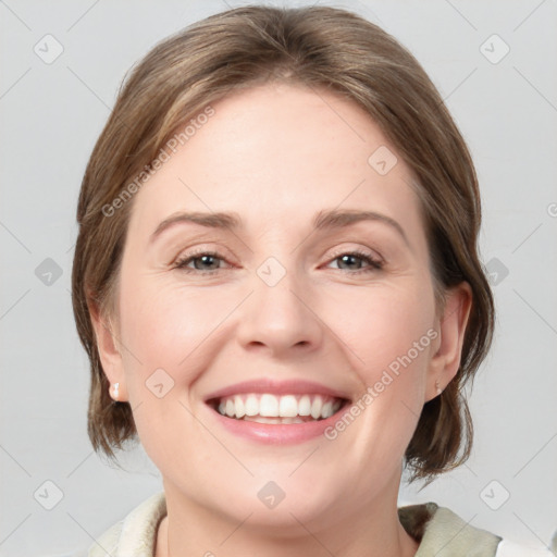 Joyful white young-adult female with medium  brown hair and blue eyes