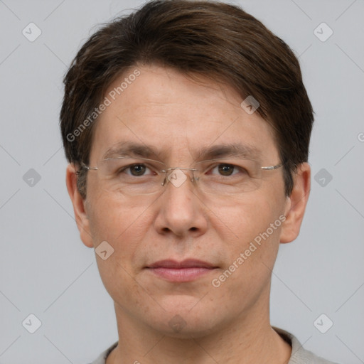 Joyful white adult male with short  brown hair and grey eyes