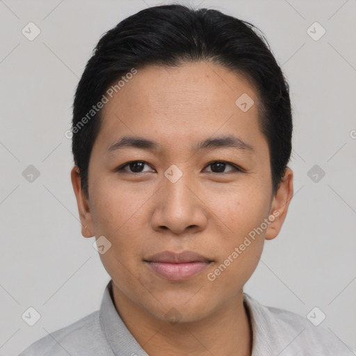 Joyful asian young-adult male with short  black hair and brown eyes