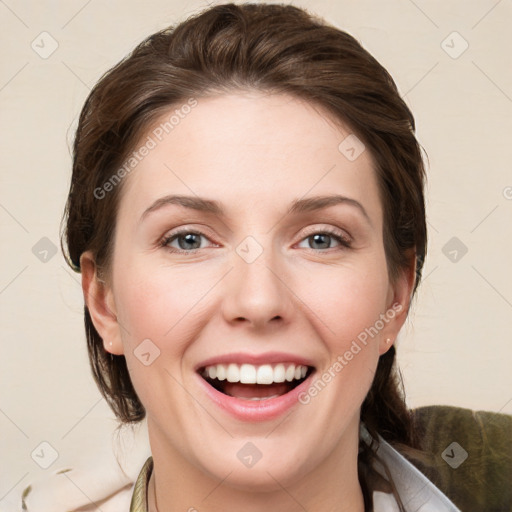 Joyful white young-adult female with medium  brown hair and grey eyes