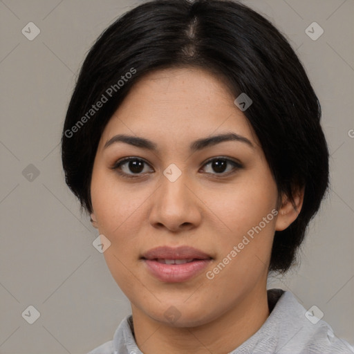 Joyful asian young-adult female with medium  black hair and brown eyes