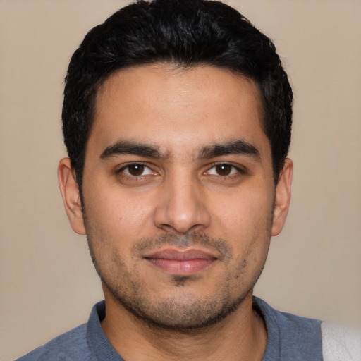 Neutral latino young-adult male with short  black hair and brown eyes