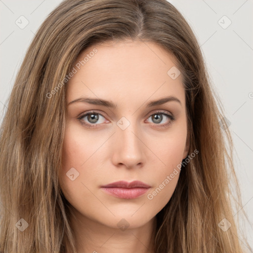 Neutral white young-adult female with long  brown hair and brown eyes