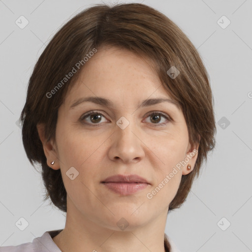 Joyful white adult female with medium  brown hair and brown eyes